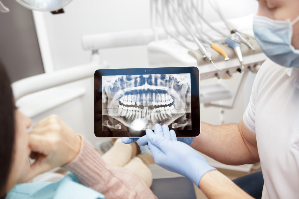 X-Rays Being Shown to Dental Patient