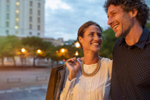 Happy couple enjoys the city's sights with clear vision.
