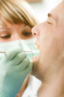 Dental Patient getting a cleaning and exam